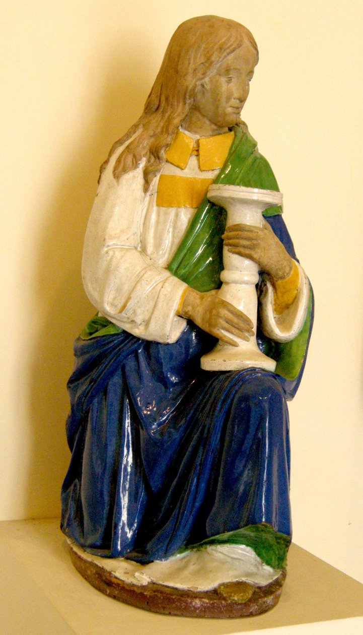Engel, der einen Kerzenhalter hält (Keramik) von Andrea Della Robbia