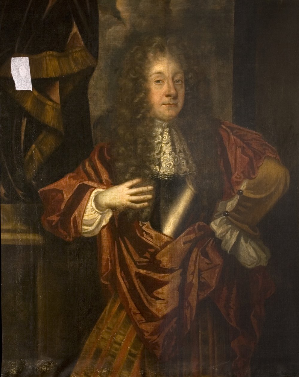 Porträt eines unbekannten Mannes in einem rostroten Mantel von British School