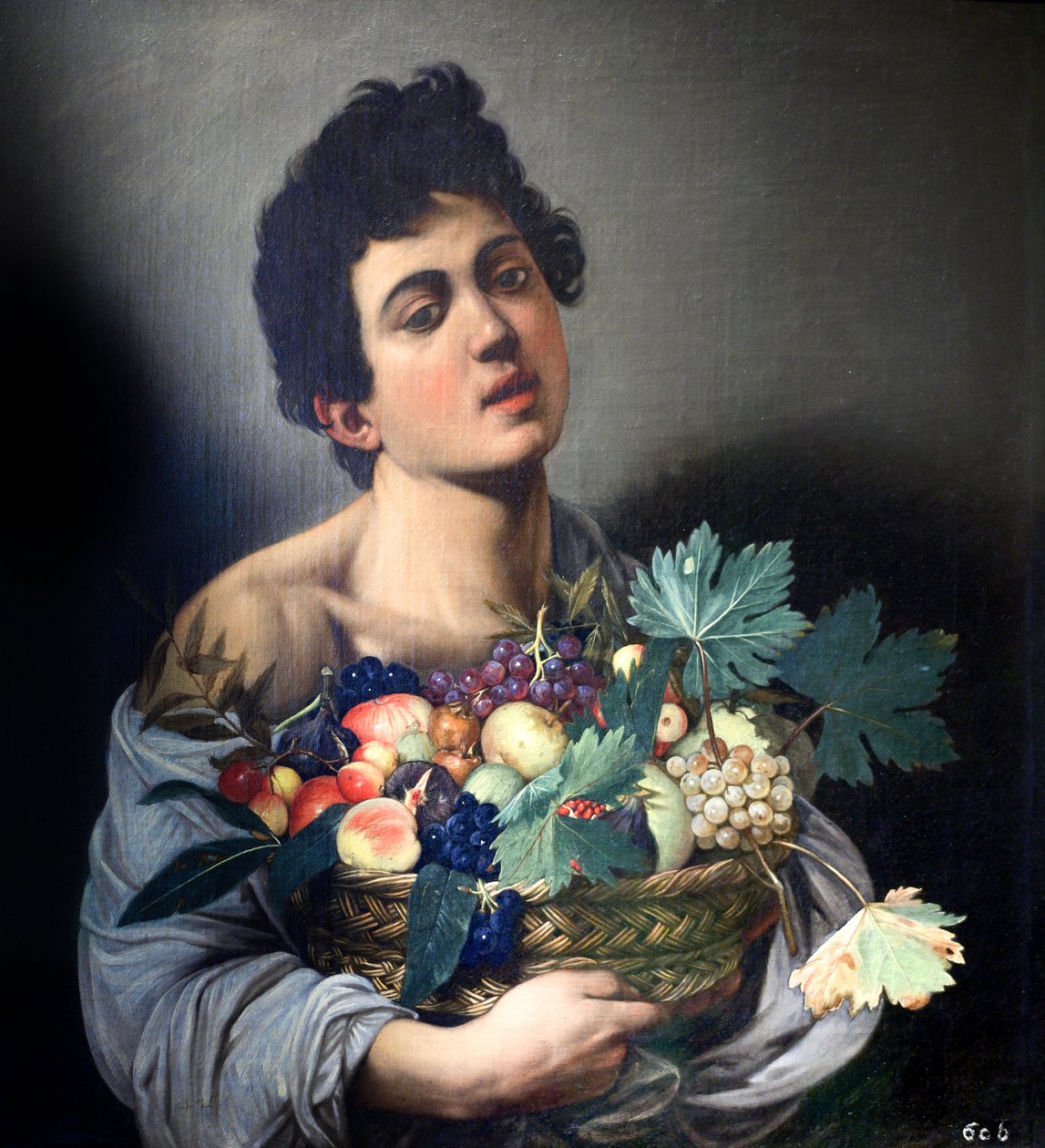 Junge mit einem Korb voller Früchte von Caravaggio von Michelangelo Merisi Caravaggio