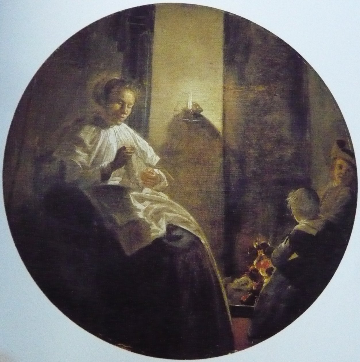 Eine Frau, die bei Kerzenlicht näht von Dirck Hals