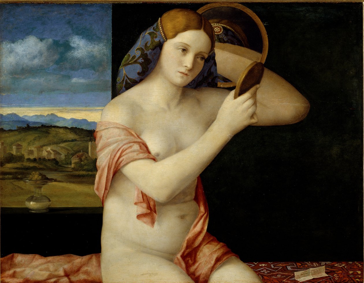 Junge Frau bei ihrer Toilette von Giovanni Bellini