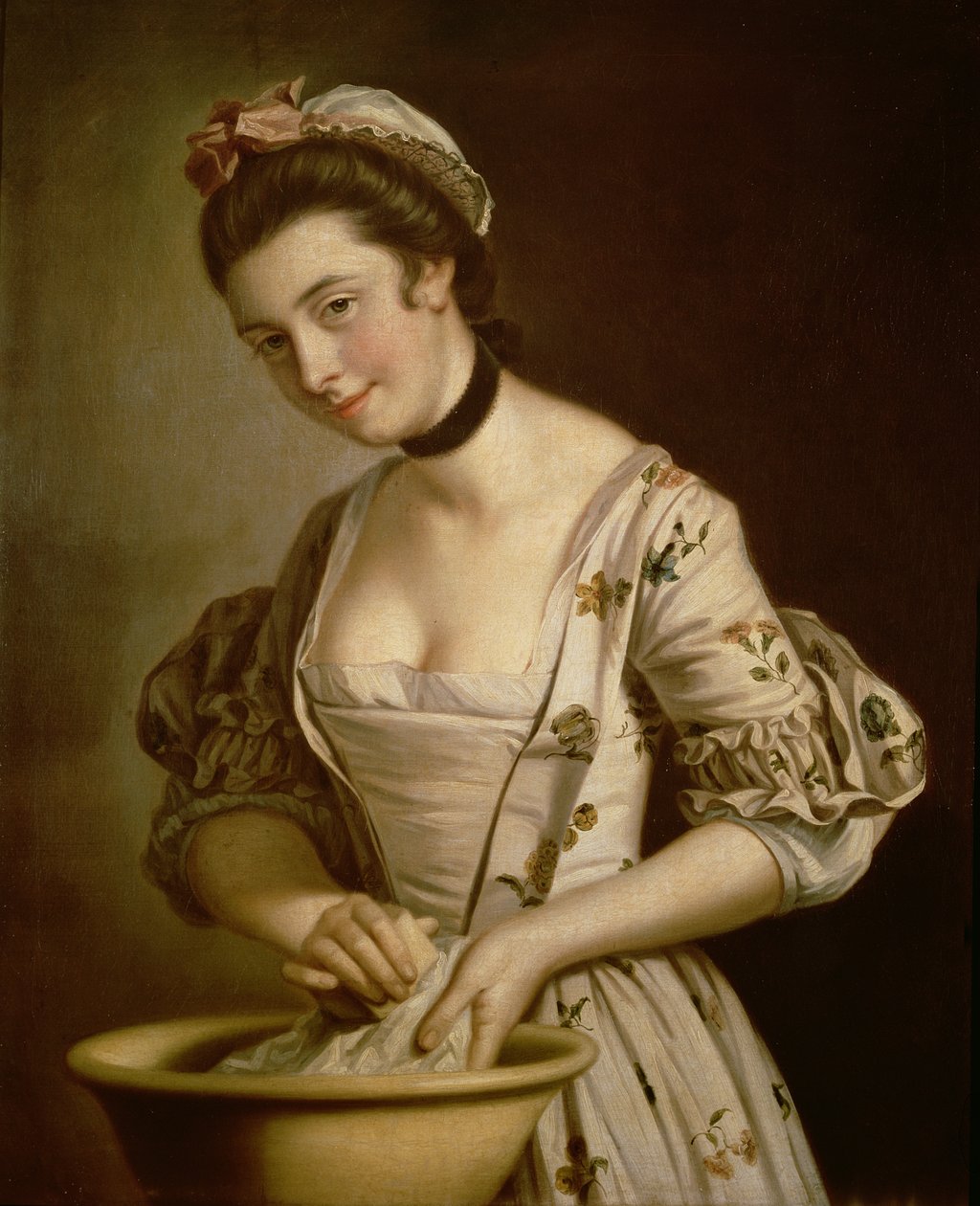 Eine Zofe seift Leinen ein von Henry Robert Morland