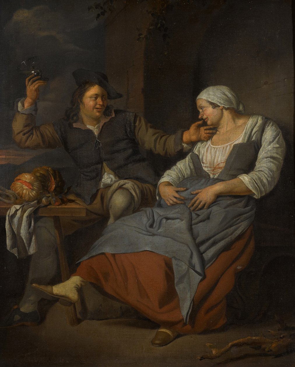 Ein sitzendes Paar beim Weingenuss von Jacob Toorenvliet