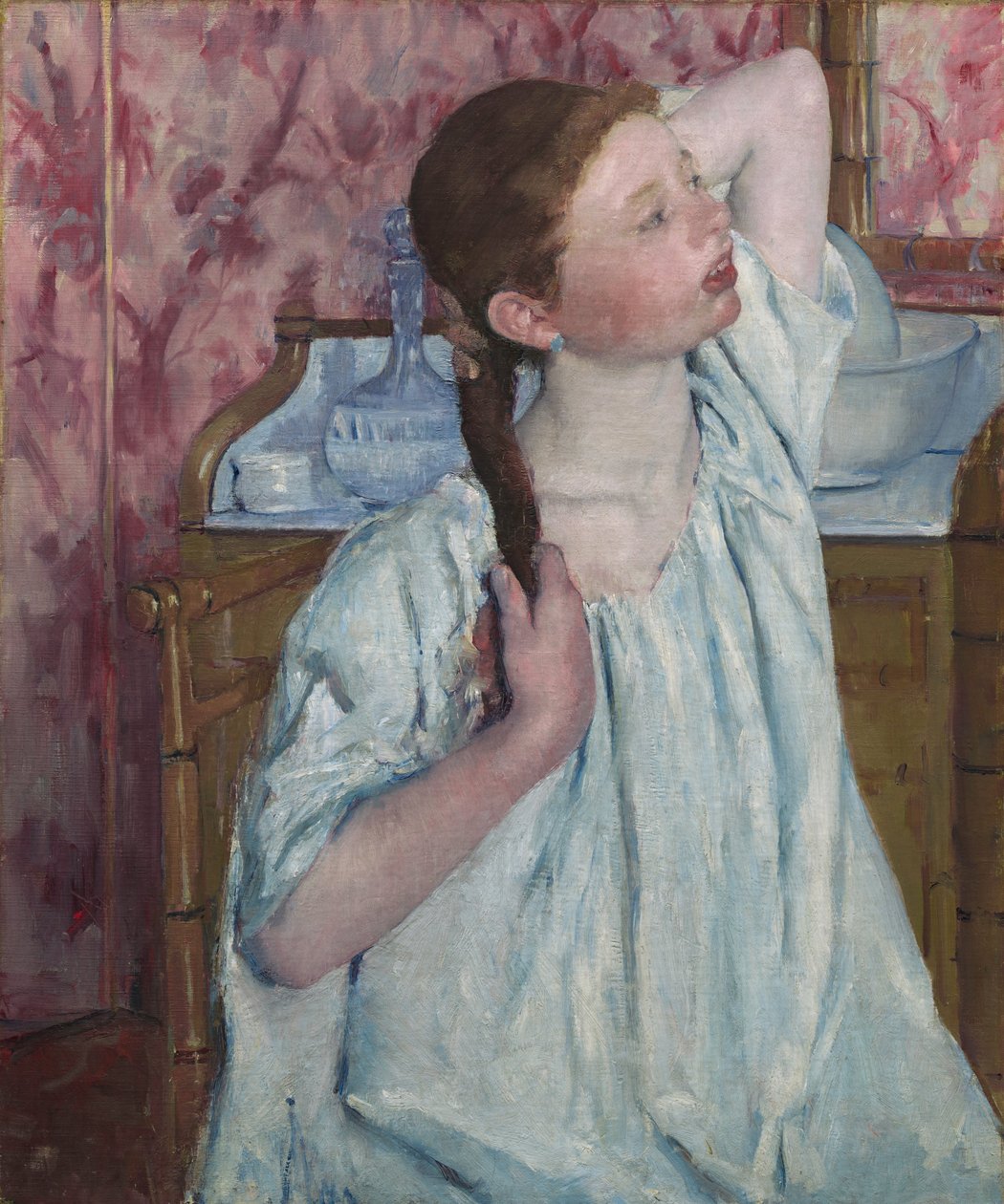 Mädchen, das ihr Haar richtet von Mary Cassatt
