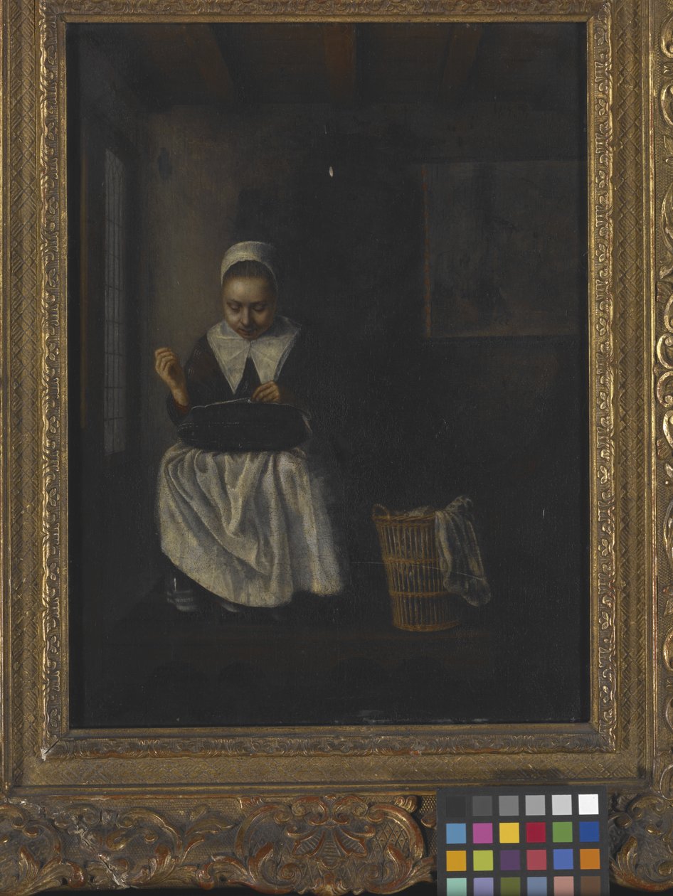 Ein Mädchen beim Nähen von Nicolaes Maes