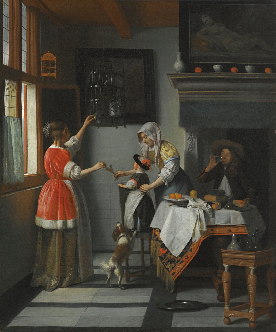Interieur mit einem Kind, das einen Papagei füttert von Pieter de Hooch