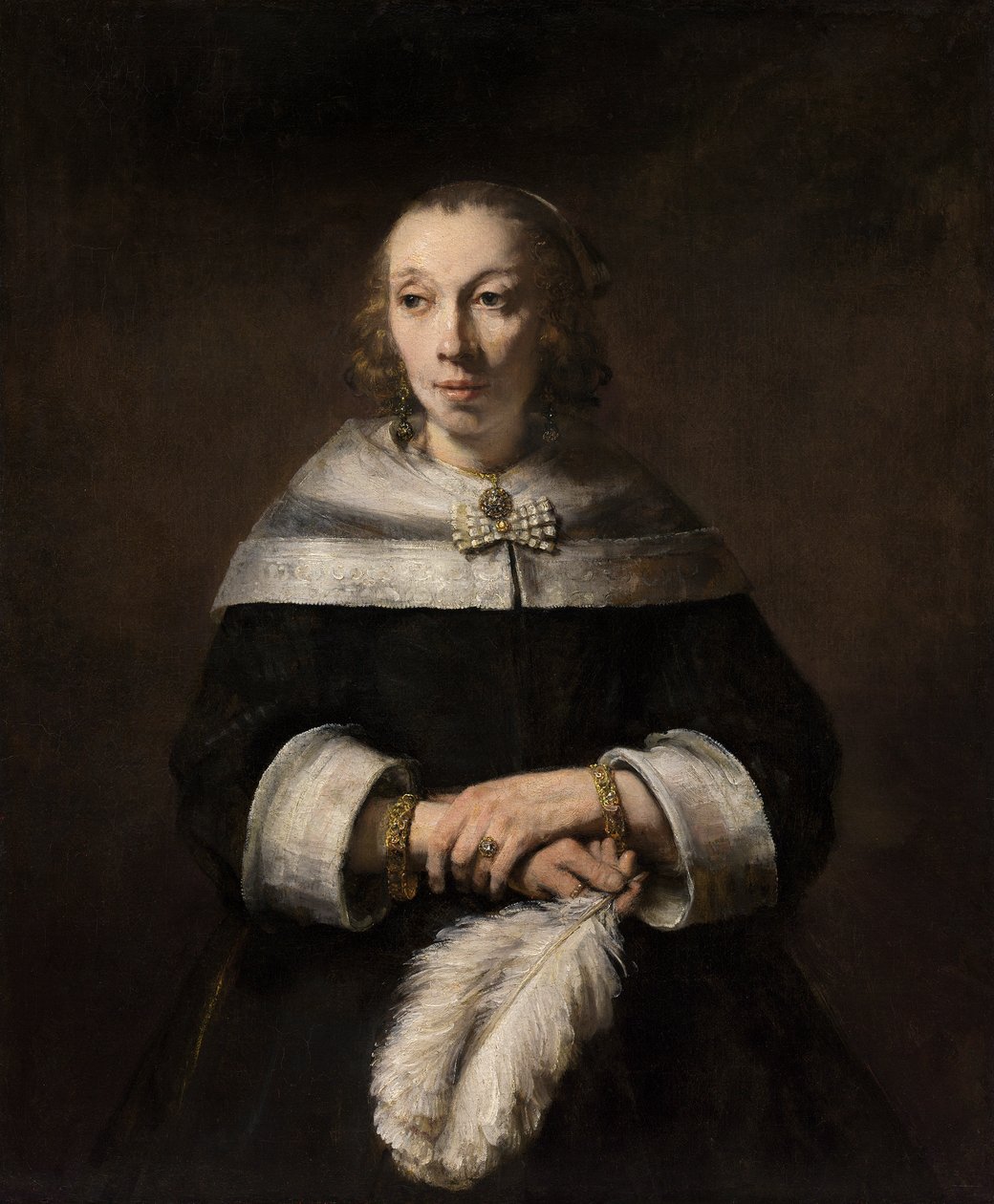 Porträt einer Dame mit einem Straußenfederfächer von Rembrandt van Rijn