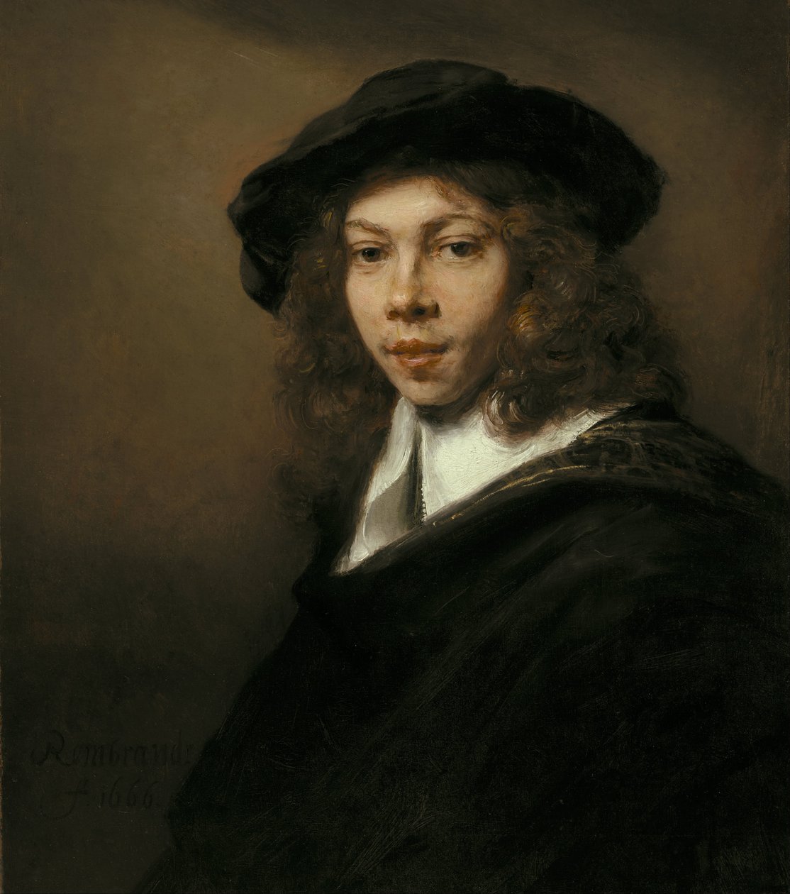 Junger Mann mit schwarzem Barett von Rembrandt van Rijn