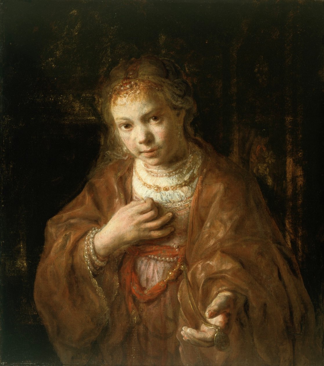 Junges Mädchen mit einer Medaille von Rembrandt