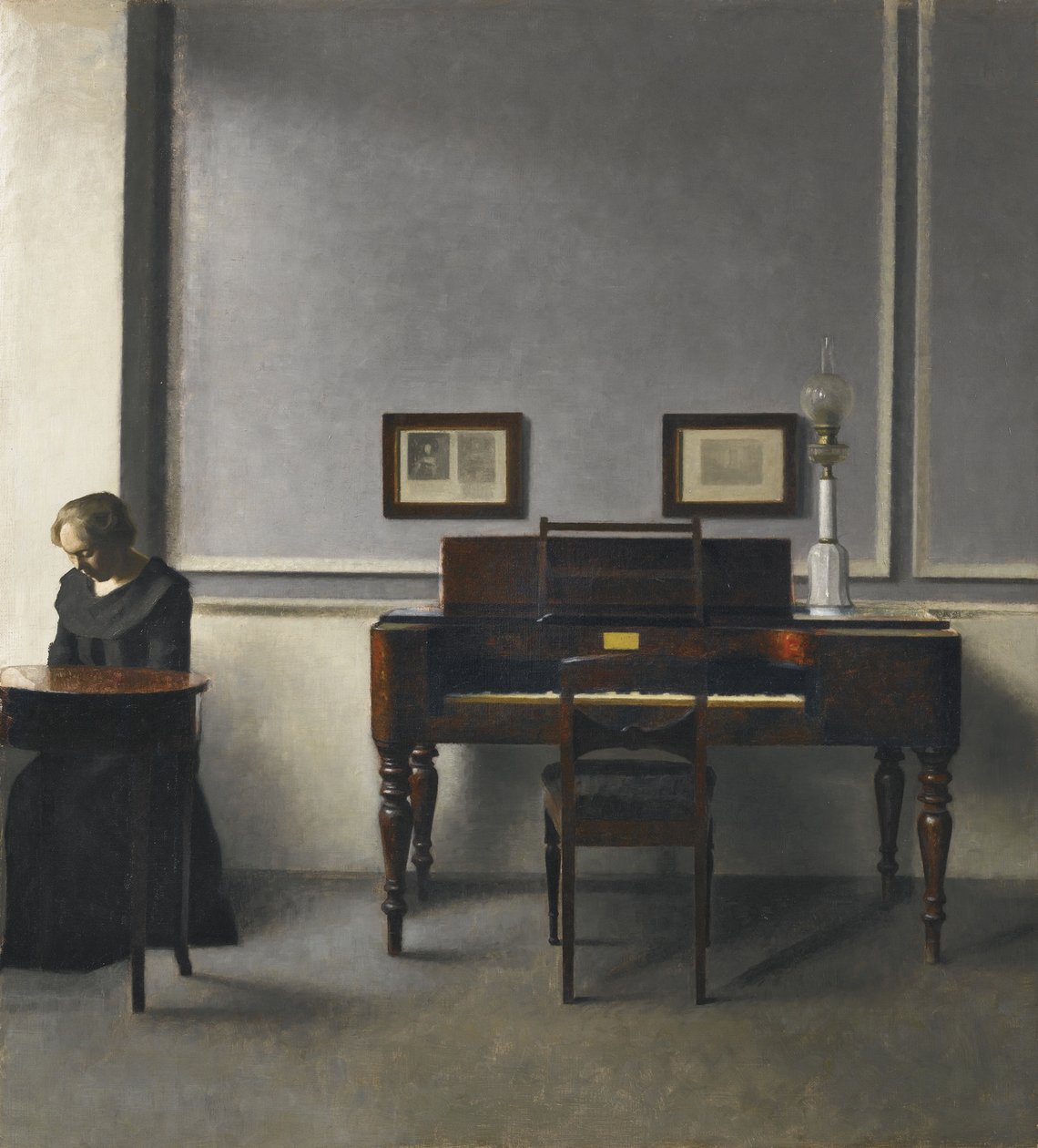 Ida in einem Innenraum mit Klavier von Vilhelm Hammershøi