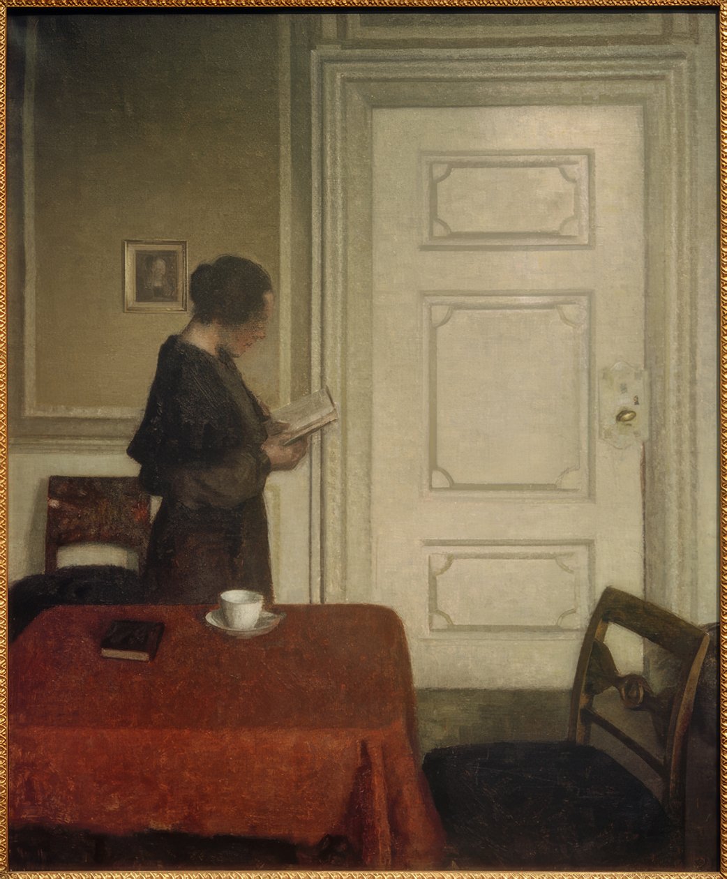 Lesende Frau von Vilhelm Hammershoi