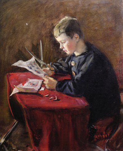 Junge schneidet Weihnachtsdekorationen von Christian Krohg