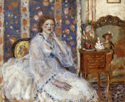 Frau, die in einem Sessel sitzt von Frederick Carl Frieseke