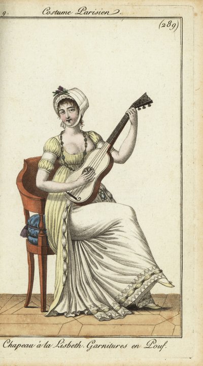 Modische Frau spielt Gitarre von French School